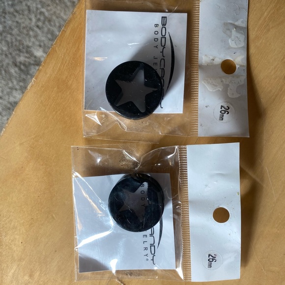 26mm star cutout plugs brand new not opened - Picture 2 of 2
